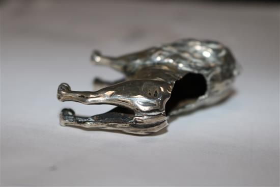 An Edwardian silver pincushion in the form of a standing lion (cushion and tail deficient),